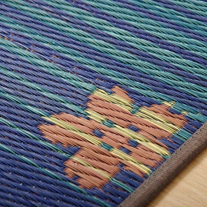 Woven cherry blossoms on blue igusa