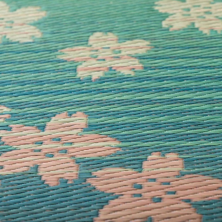 Woven cherry blossoms on green igusa